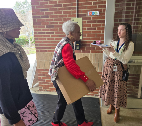 Philethea Circle deliver bags to middle and high schools